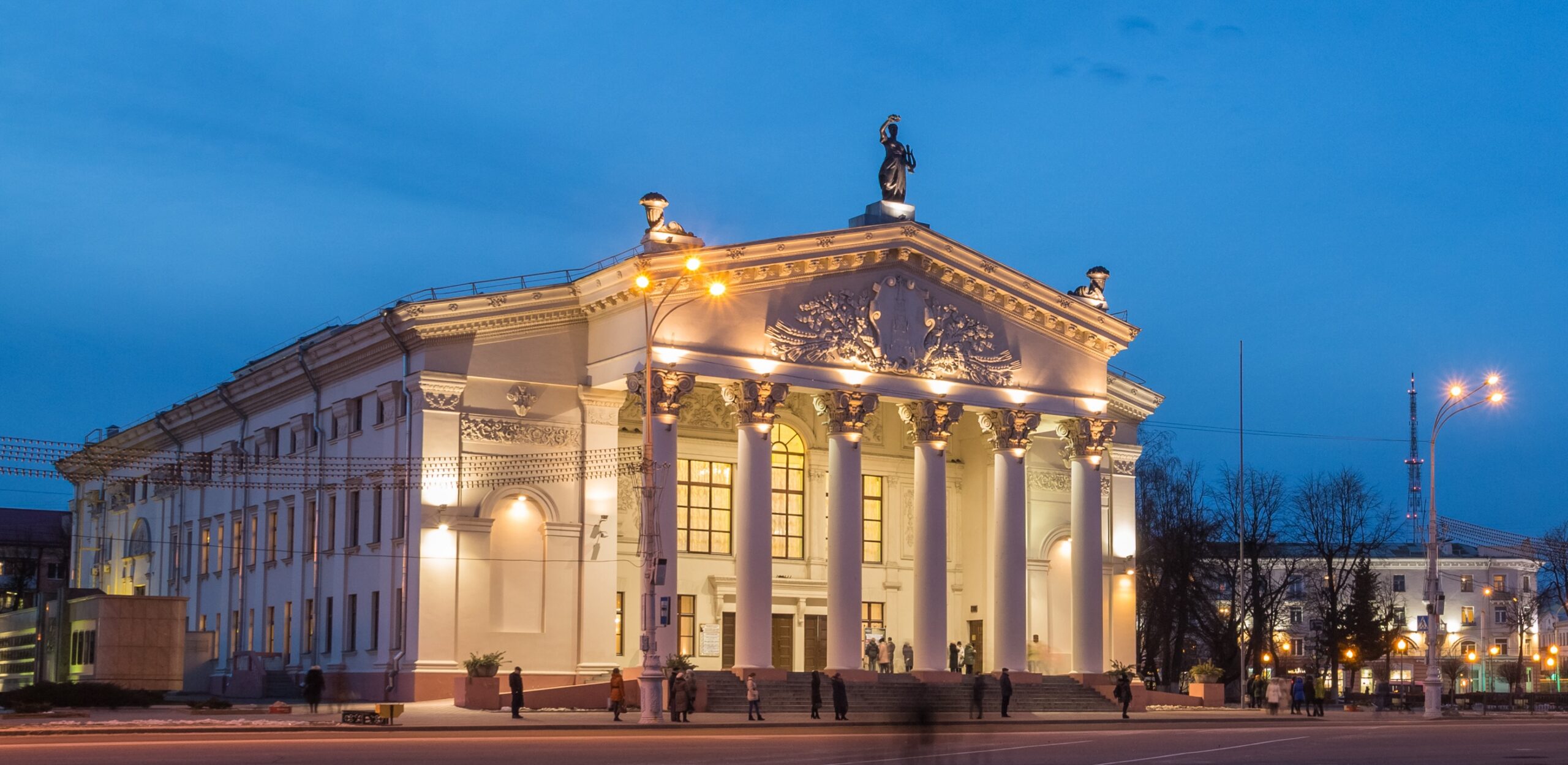 Map of Gomel in night light and views of the Regional Drama Theatre. Lenin Square